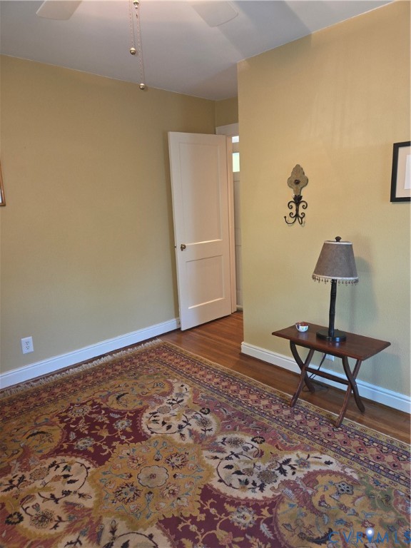7733 Rock Creek Road Henrico, VA 23229 - Photo 48 of 73 a view of a bedroom with wooden floor and bench