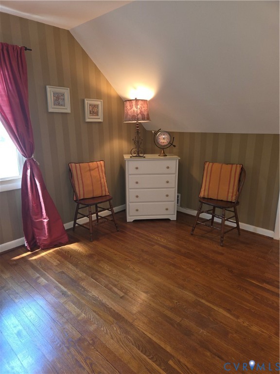 7733 Rock Creek Road Henrico, VA 23229 - Photo 50 of 73 a room with a chair and dresser