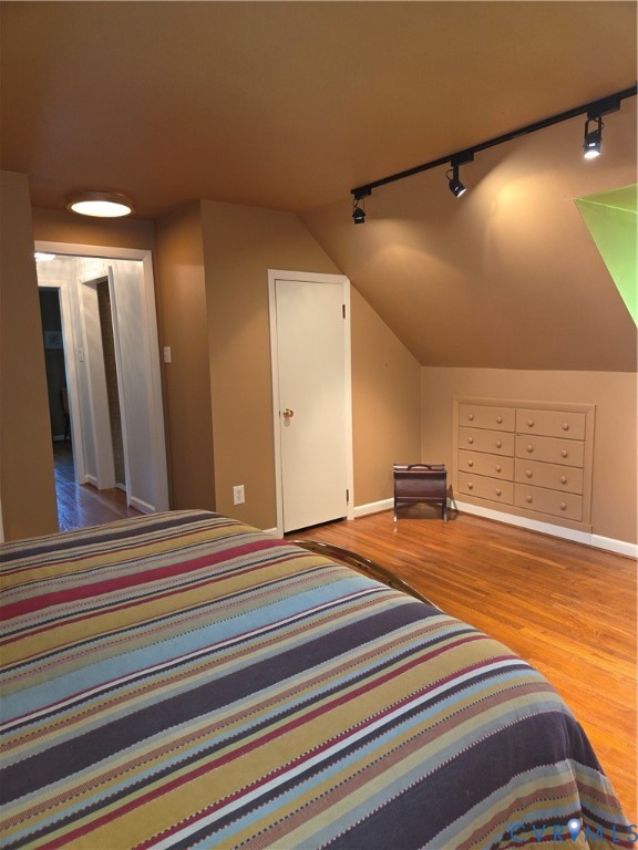 7733 Rock Creek Road Henrico, VA 23229 - Photo 58 of 73 a bedroom with a bed and a flat screen tv