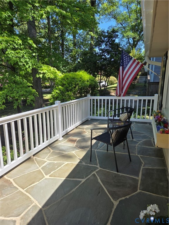 7733 Rock Creek Road Henrico, VA 23229 - Photo 9 of 73 a view of balcony with wooden floor and outdoor seating
