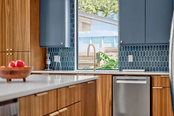 a kitchen with a sink and a window