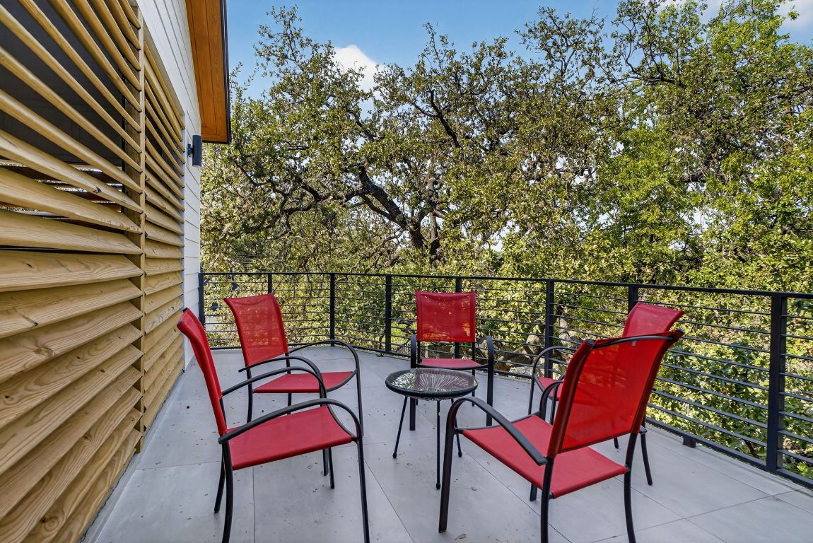 2316 Euclid Avenue Austin, TX 78704 - Photo 22 of 40 an outdoor sitting area with chairs and wooden fence
