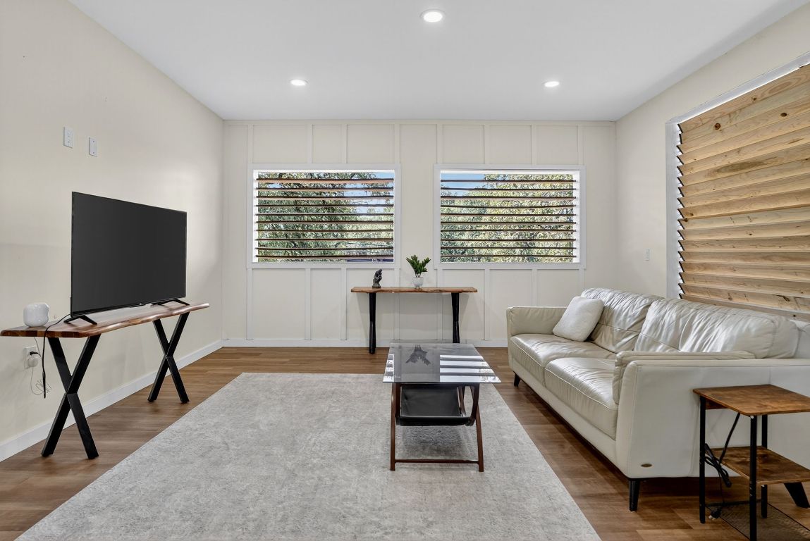2316 Euclid Avenue Austin, TX 78704 - Photo 24 of 40 a living room with furniture and a flat screen tv