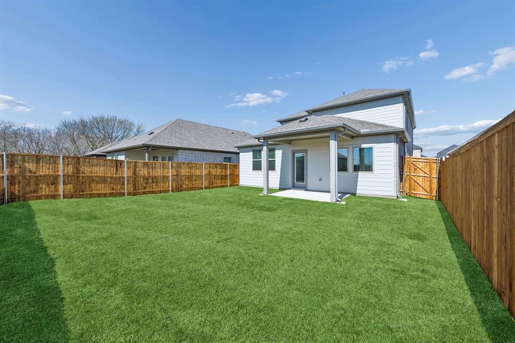 332 Millwood Road Lavon, TX 75166 - Photo 29 of 32 Covered Patio in the Mesquite home plan by Trophy Signature Homes – REPRESENTATIVE PHOTO