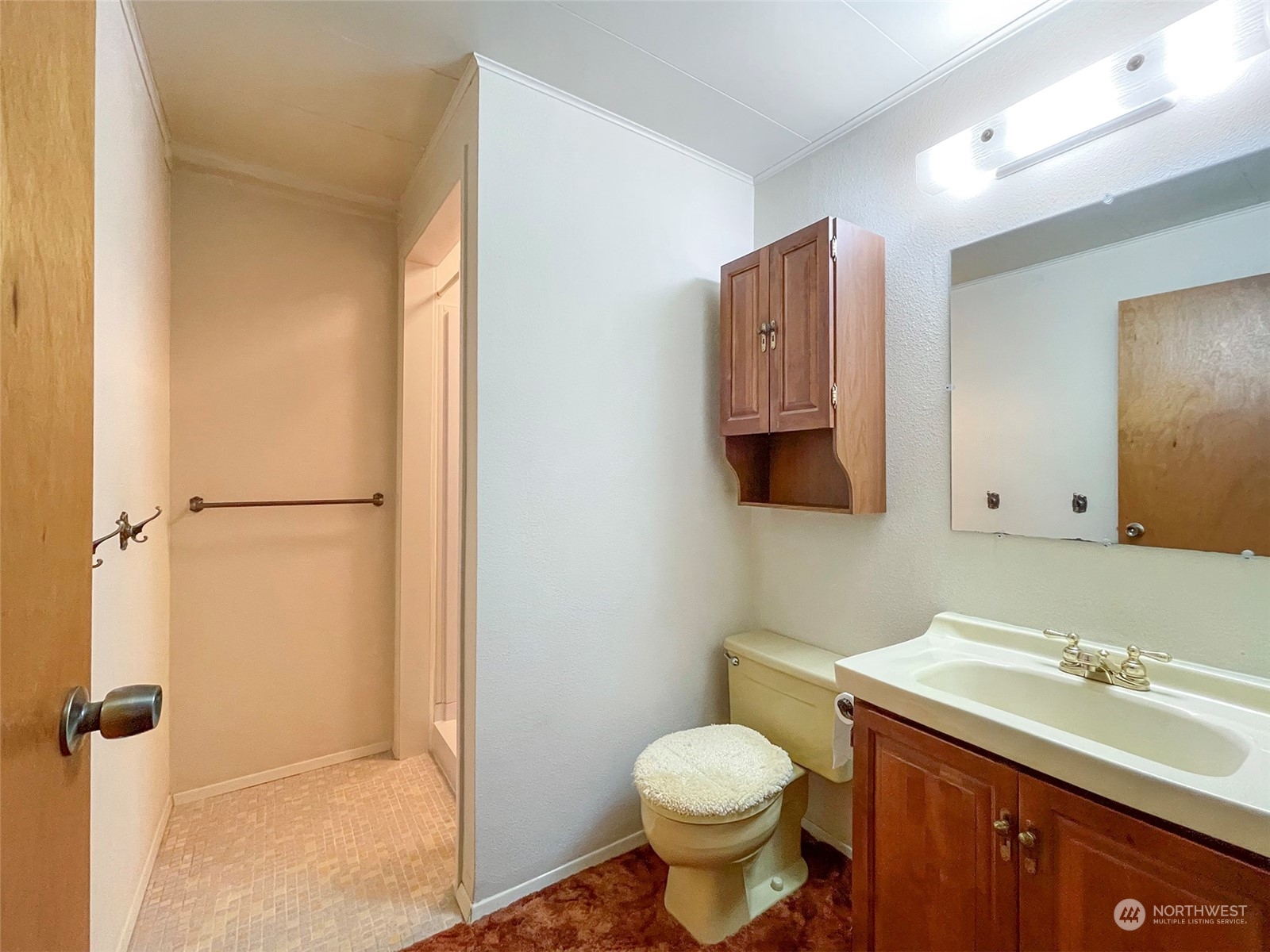 4217 South Bean Road Port Angeles, WA 98363 - Photo 27 of 40 a bathroom with a sink toilet and vanity