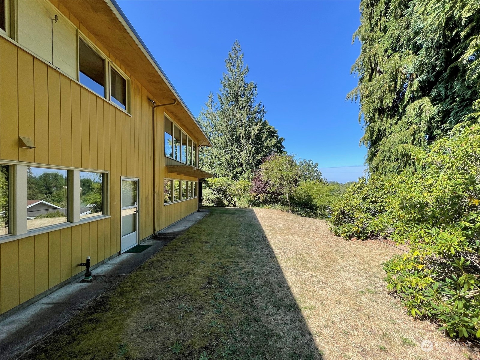 4217 South Bean Road Port Angeles, WA 98363 - Photo 30 of 40 a pathway of a house with a yard