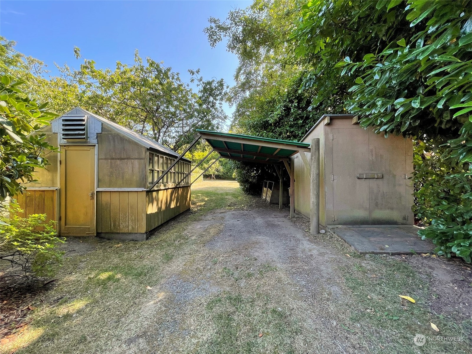 4217 South Bean Road Port Angeles, WA 98363 - Photo 40 of 40 a view of backyard with small garden and entertaining space