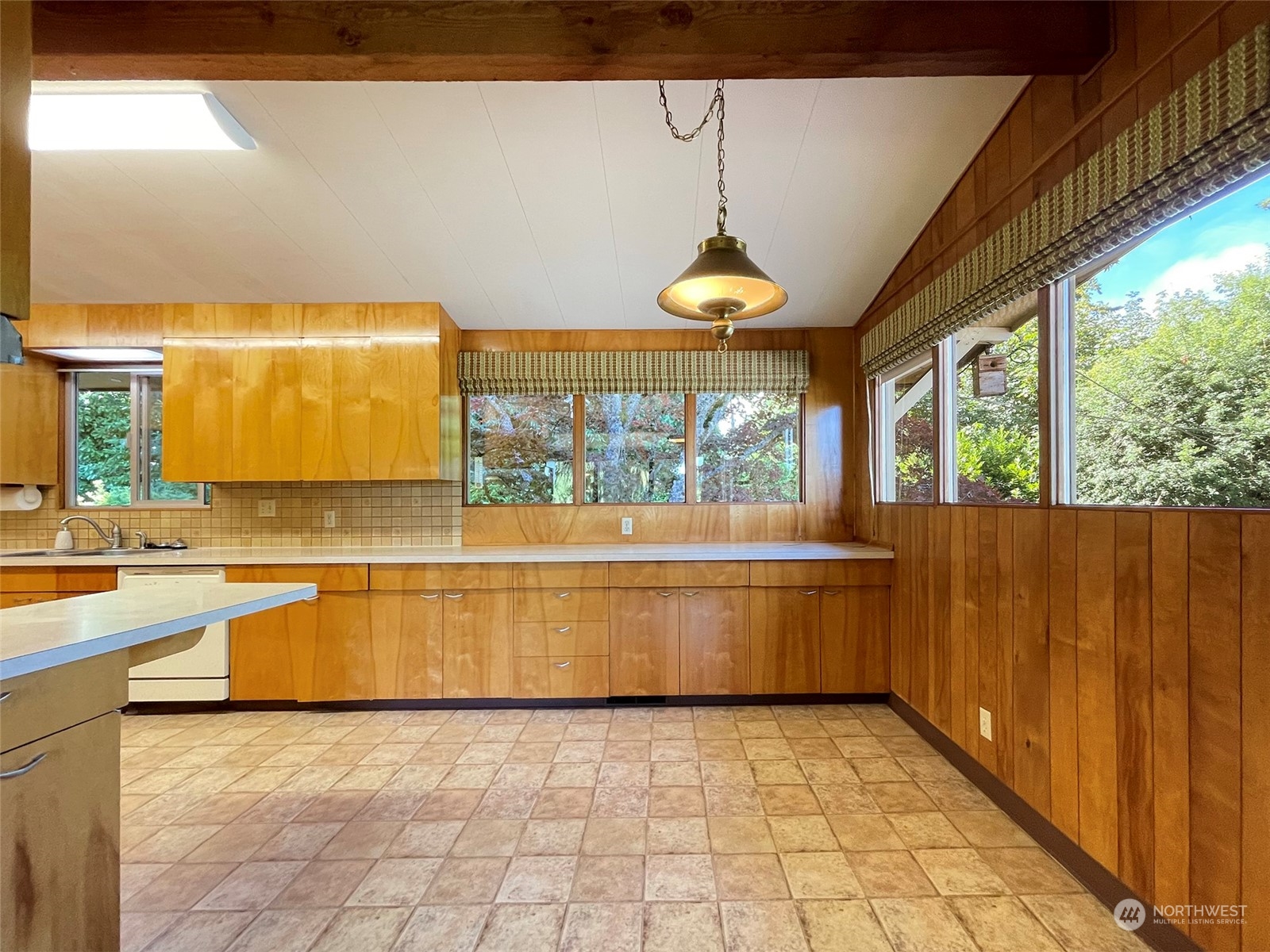 4217 South Bean Road Port Angeles, WA 98363 - Photo 10 of 40 a view of a kitchen with a large window