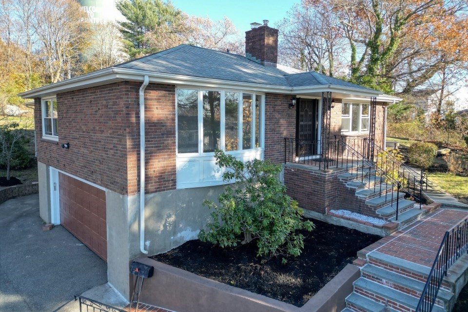 48 Conrad Street Braintree, MA 02184 - Photo 1 of 36 a front view of a house with garden