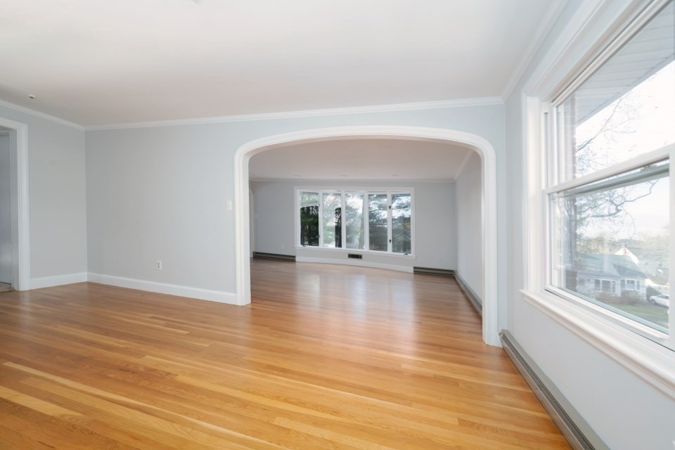 48 Conrad Street Braintree, MA 02184 - Photo 16 of 36 a view of livingroom with furniture wooden floor and windows