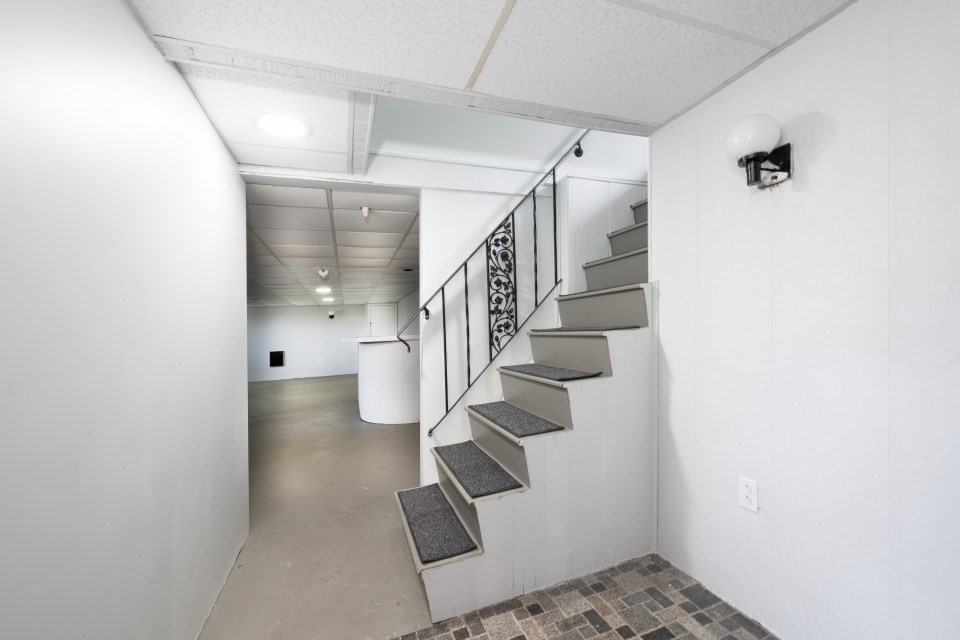 48 Conrad Street Braintree, MA 02184 - Photo 26 of 36 a view of entryway with stairs and wooden floor