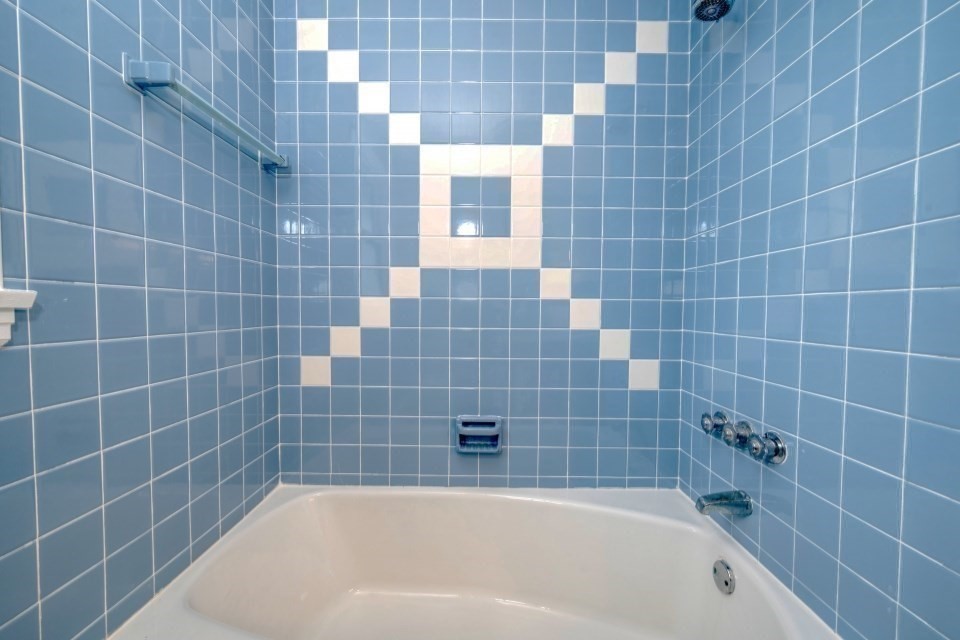48 Conrad Street Braintree, MA 02184 - Photo 29 of 36 a bathroom with a bathtub