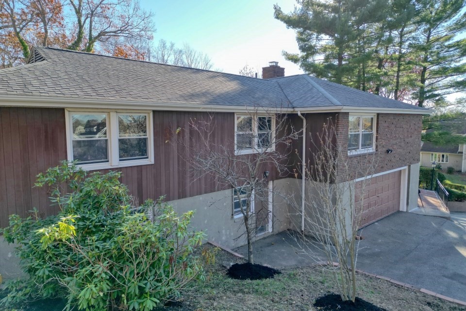 48 Conrad Street Braintree, MA 02184 - Photo 5 of 36 a front view of a house with garden