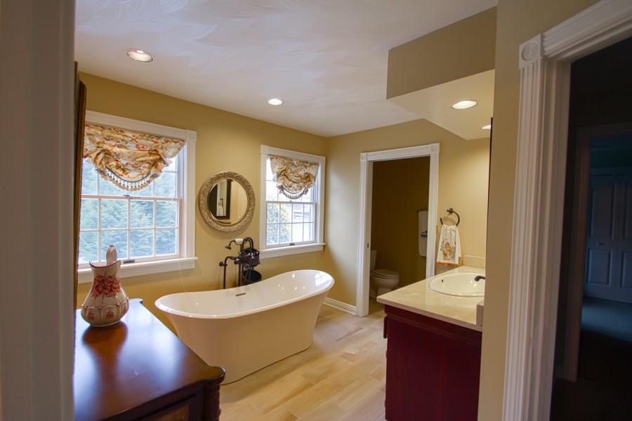 447 Dinnerbell Road Butler, PA 16002 - Photo 14 of 25 Master suite comes complete with master bath featuring soaking tub and stone flooring.