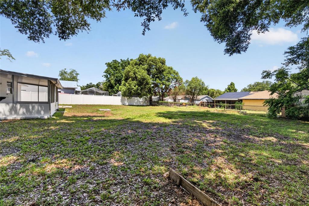 2340 Merrily Circle South Seffner, FL 33584 - Photo 40 of 52 a view of a lake with a big yard
