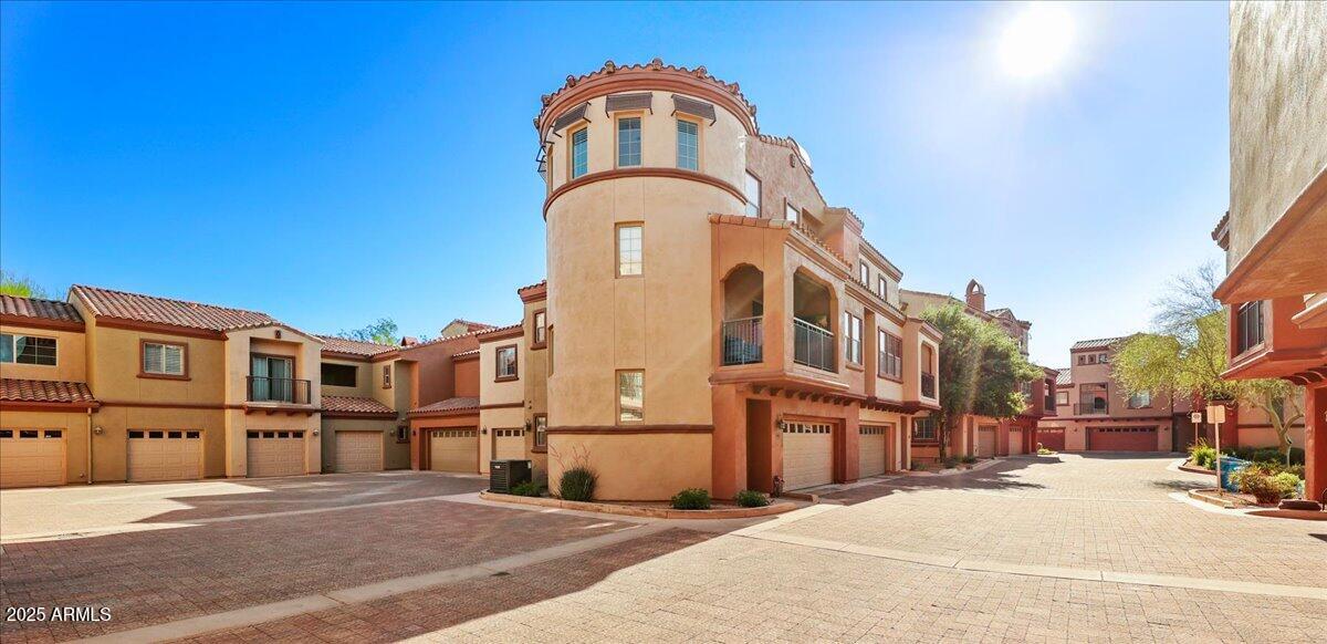3935 East Rough Rider Road, Unit 1016 Phoenix, AZ 85050 - Photo 17 of 27 Sideview End Unit