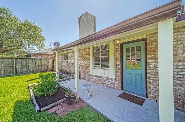 a view of a two chair in the patio