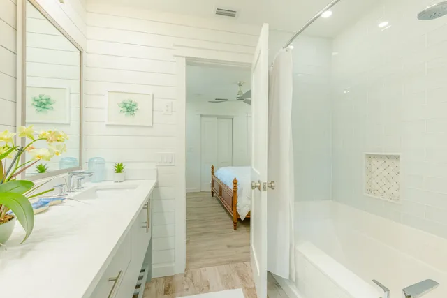 a bathroom with a bathtub and a sink