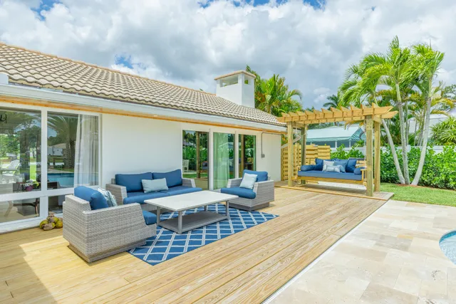 a outdoor living space with furniture and garden view