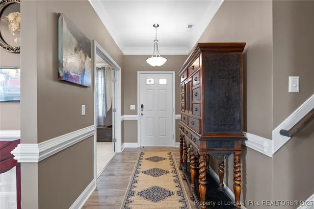 a view of a hallway with entryway