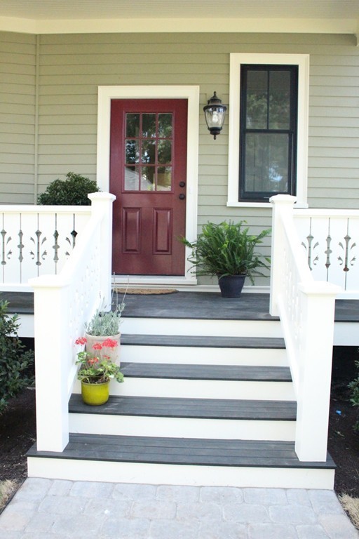 166 Parmenter Road Newton, MA 02465 - Photo 28 of 30 a front view of a house with potted plants