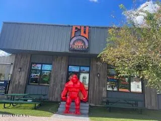 a view of parking with cars parked