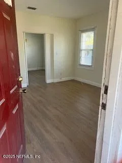 an empty room with windows