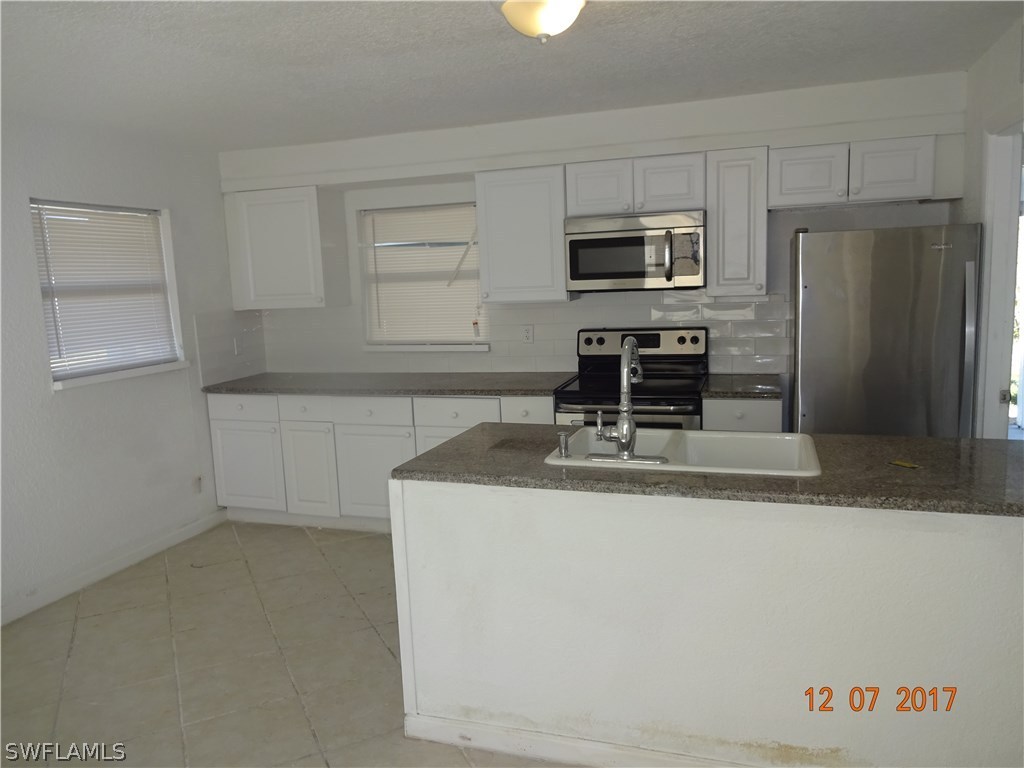 122 Alabama Road South Lehigh Acres, FL 33936 - Photo 5 of 7 Gallery Image 5