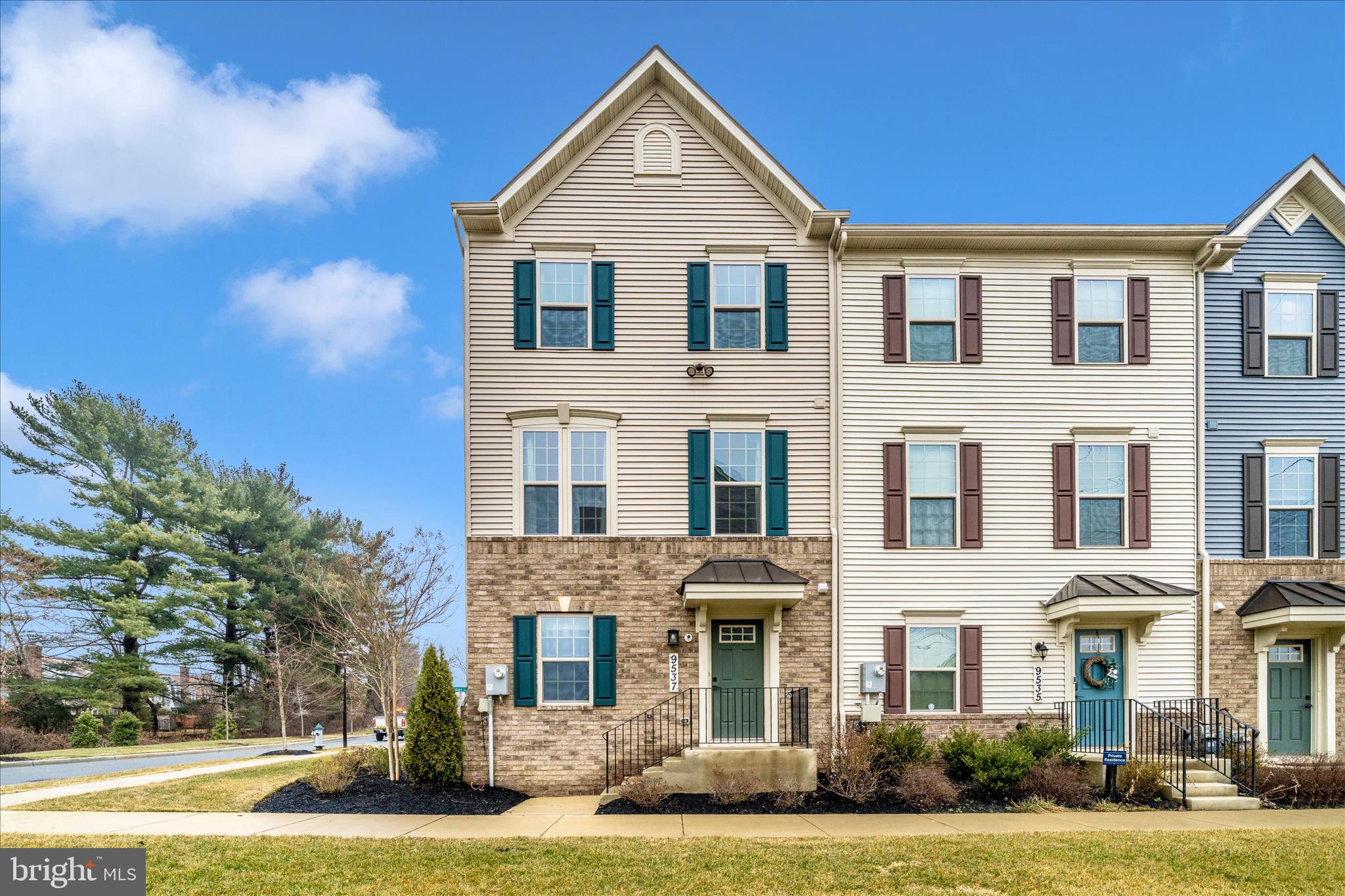 9537 Tall Oaks Road Montgomery Village, MD 20886 - Photo 1 of 53 a front view of a house with garden