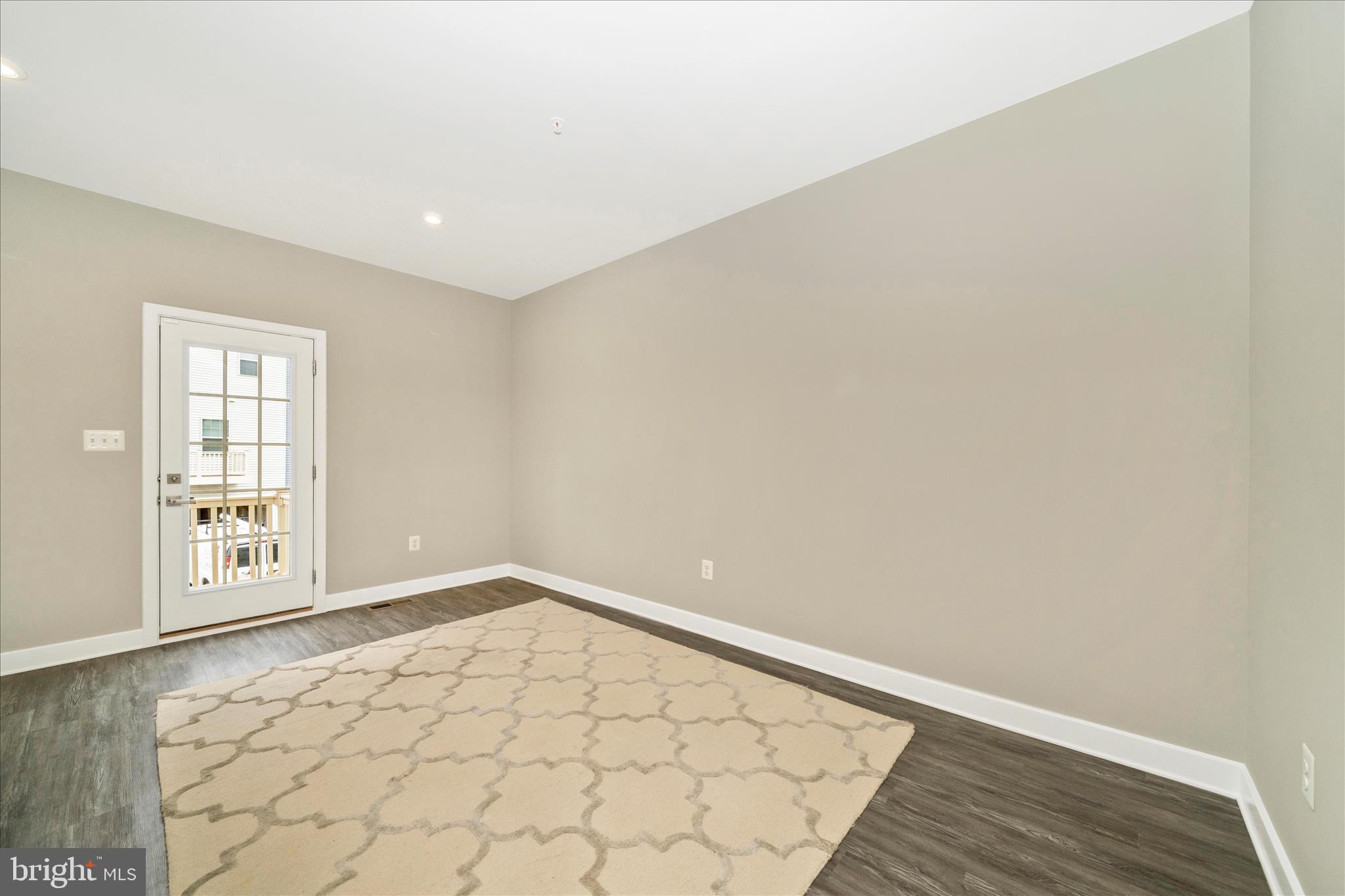 9537 Tall Oaks Road Montgomery Village, MD 20886 - Photo 13 of 53 an empty room with windows
