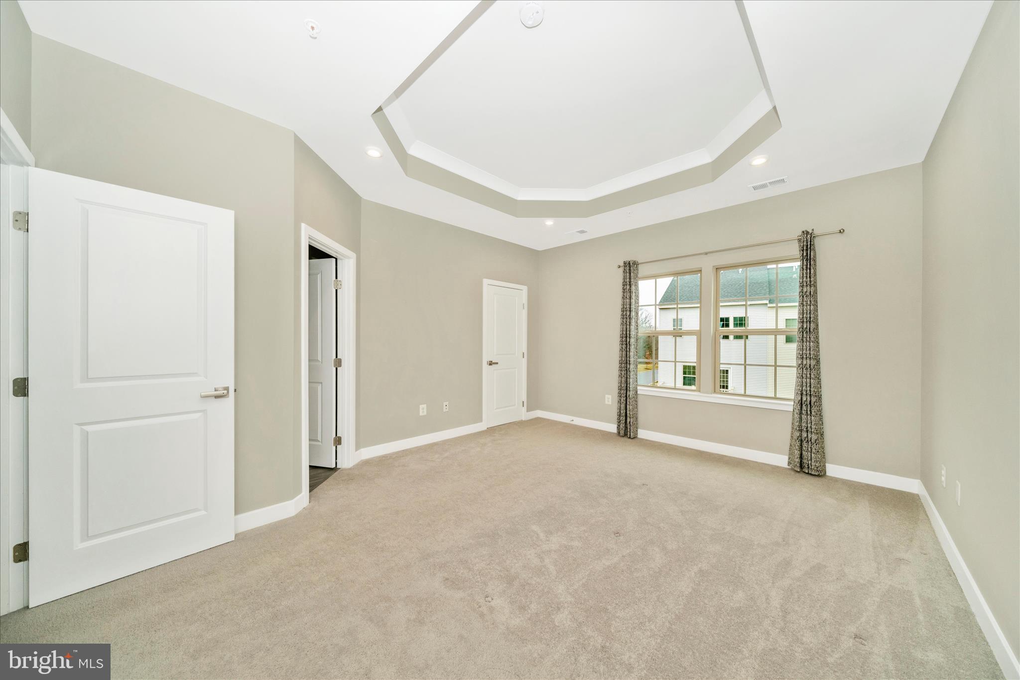9537 Tall Oaks Road Montgomery Village, MD 20886 - Photo 25 of 53 a view of an empty room with a window