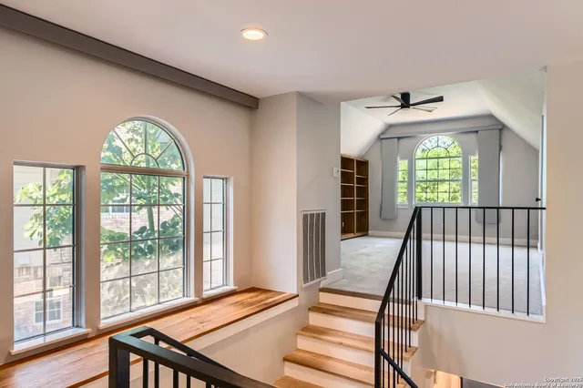 a view of a hallway view with staircase