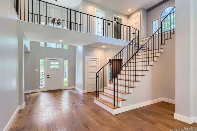 a view of entryway with wooden floor