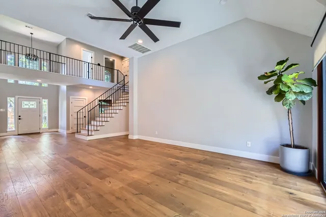 a view of a hallway with a flower pot