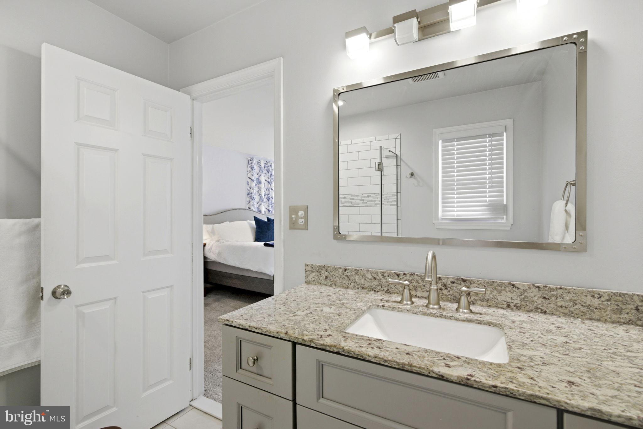 402 North Shamrock Road Bel Air, MD 21014 - Photo 22 of 50 Granite countertop, gray vanity