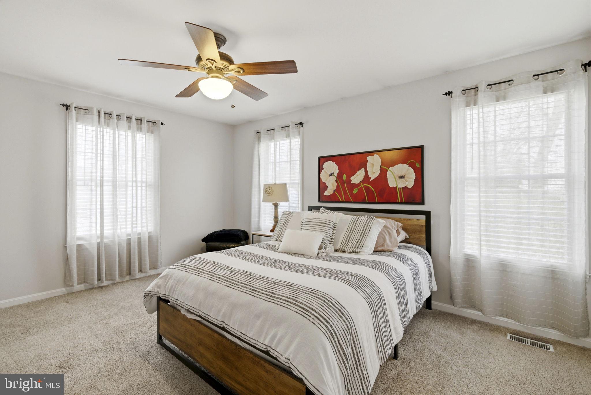 402 North Shamrock Road Bel Air, MD 21014 - Photo 23 of 50 Bedroom 2 - Carpet floor, ceiling fan, 3 windows