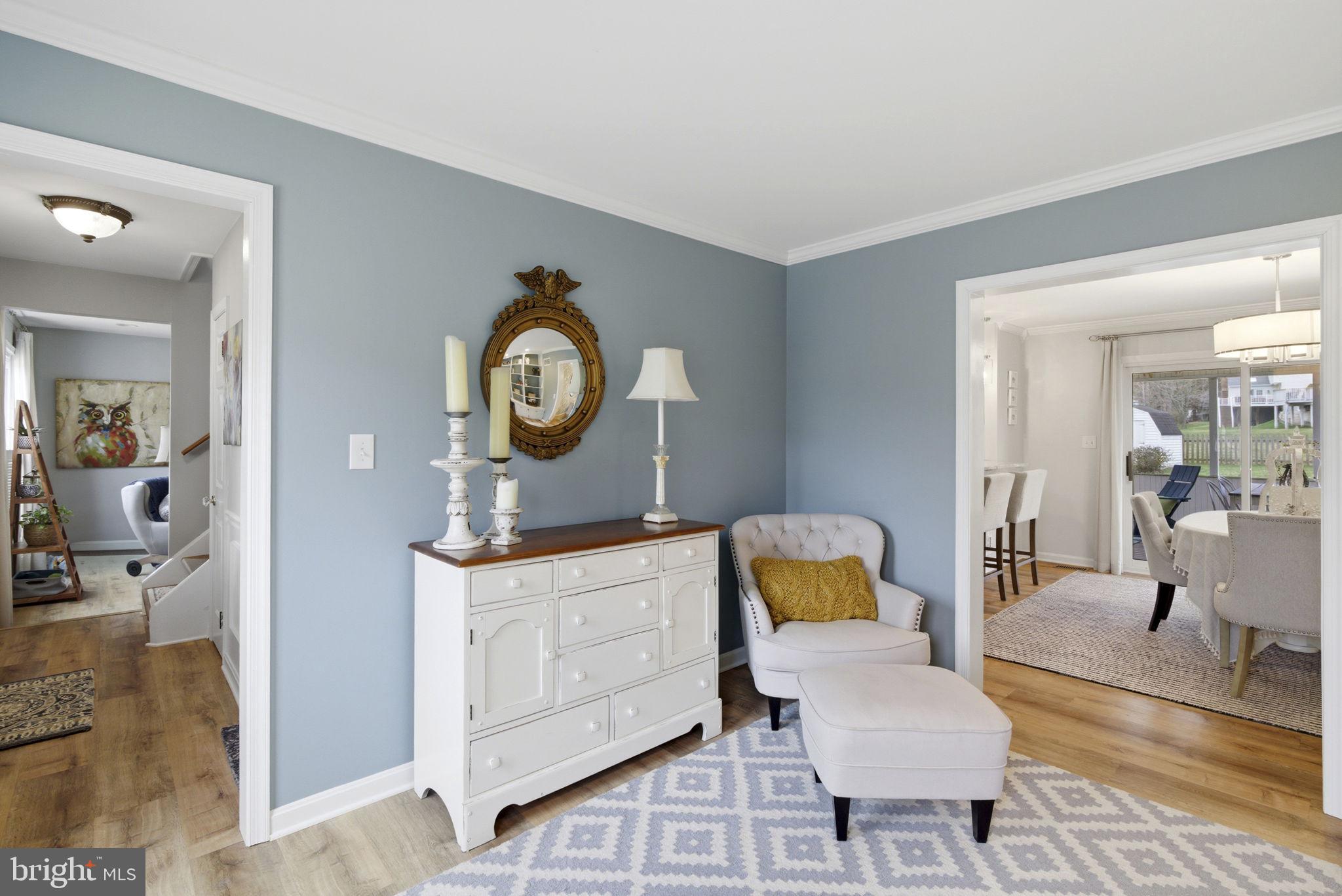 402 North Shamrock Road Bel Air, MD 21014 - Photo 7 of 50 Living room - crown molding & LVP flooring