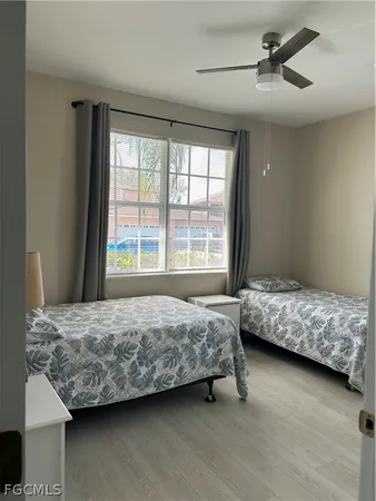 a bathroom with a granite countertop toilet a sink and a bathtub