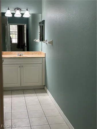 a kitchen with a sink a stove and refrigerator