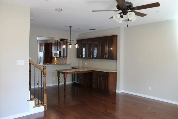 a view of a kitchen and dining room