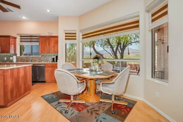 view of living room with furniture and floor to ceiling windows