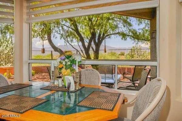 a kitchen with granite countertop a sink appliances and cabinets