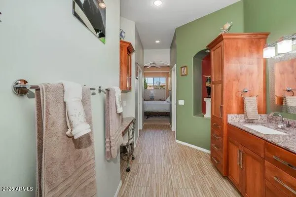 a white toilet sitting next to a shower curtain