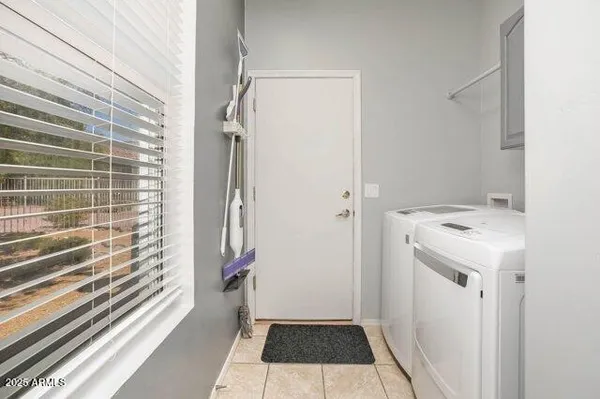 a bathroom with a mirror and a street view
