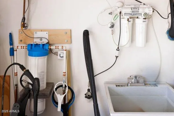 a view of a porch with chairs and backyard