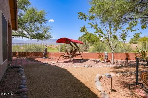 a view of swimming pool with outdoor seating
