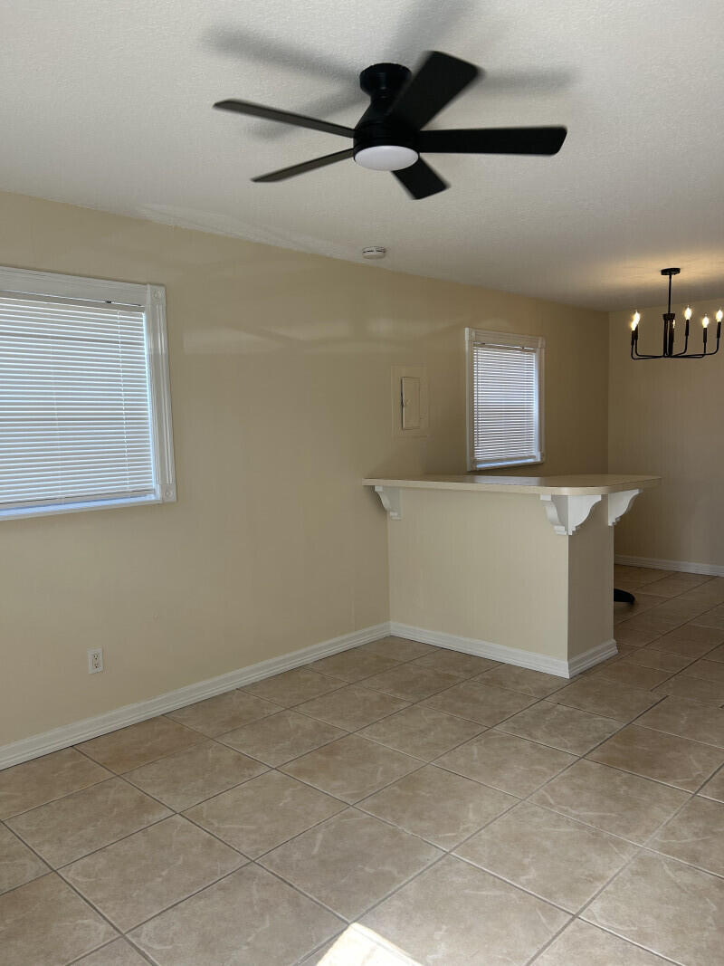 6793 4th Street Jupiter, FL 33458 - Photo 5 of 14 a view of an empty room