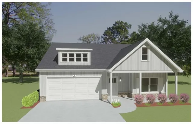 a front view of a house with garden