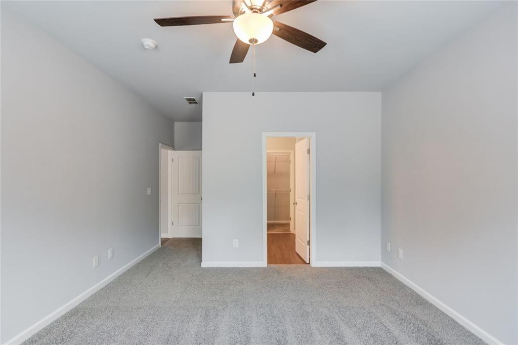 0 Harvest Church Road, Unit 1 Clarkesville, GA 30523 - Photo 23 of 38 a view of an empty room and chandelier fan