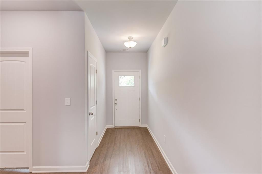 0 Harvest Church Road, Unit 1 Clarkesville, GA 30523 - Photo 7 of 38 a view of hallway with wooden floor